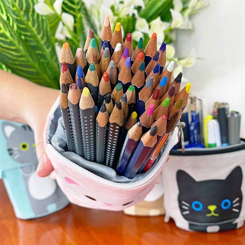 Coloring pencils organized inside of a Cute Cat Sliding Pencil Case made by PushCases